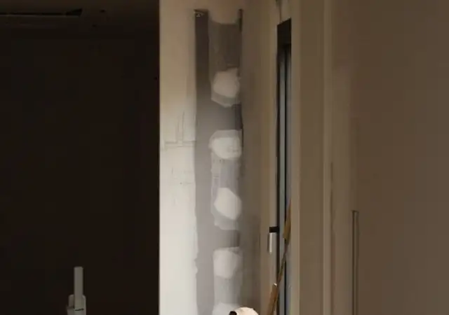 Hallway wall with electrical work in progress
